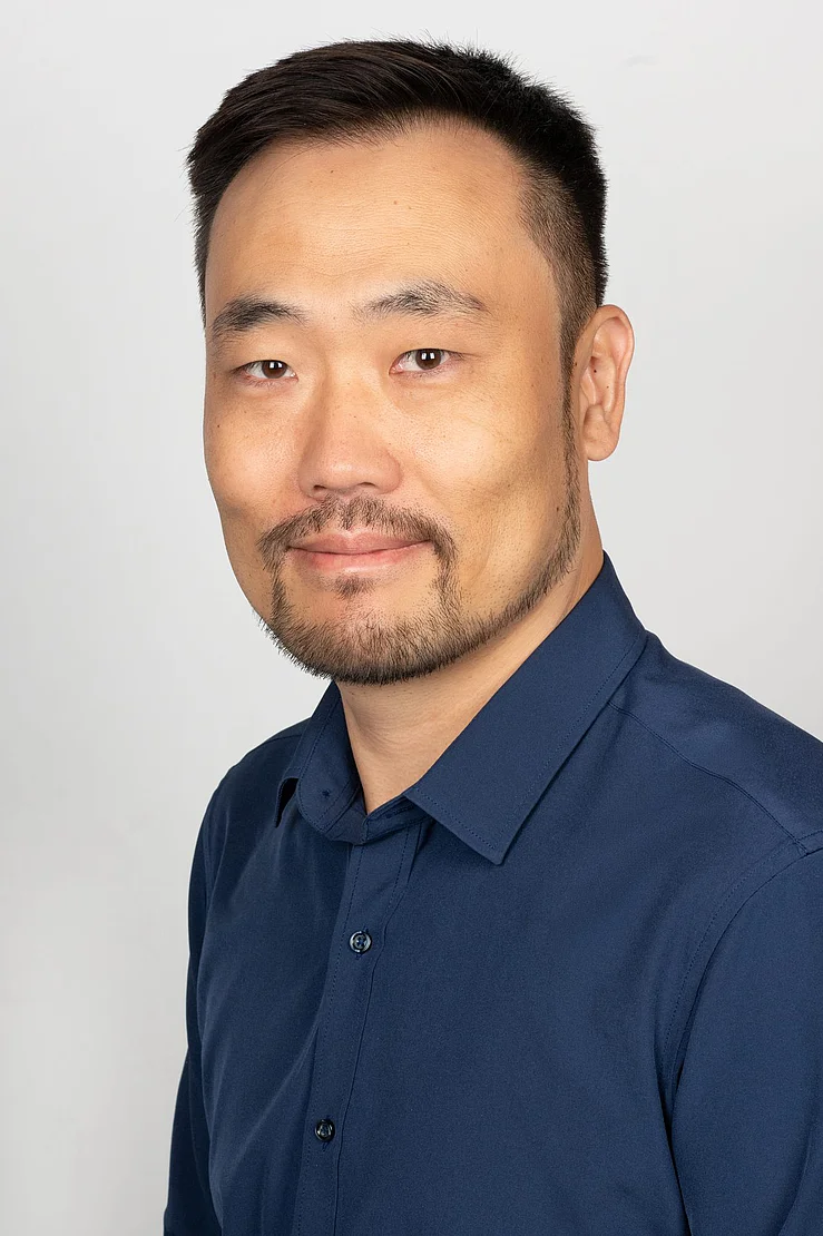 Tiezhi Wang