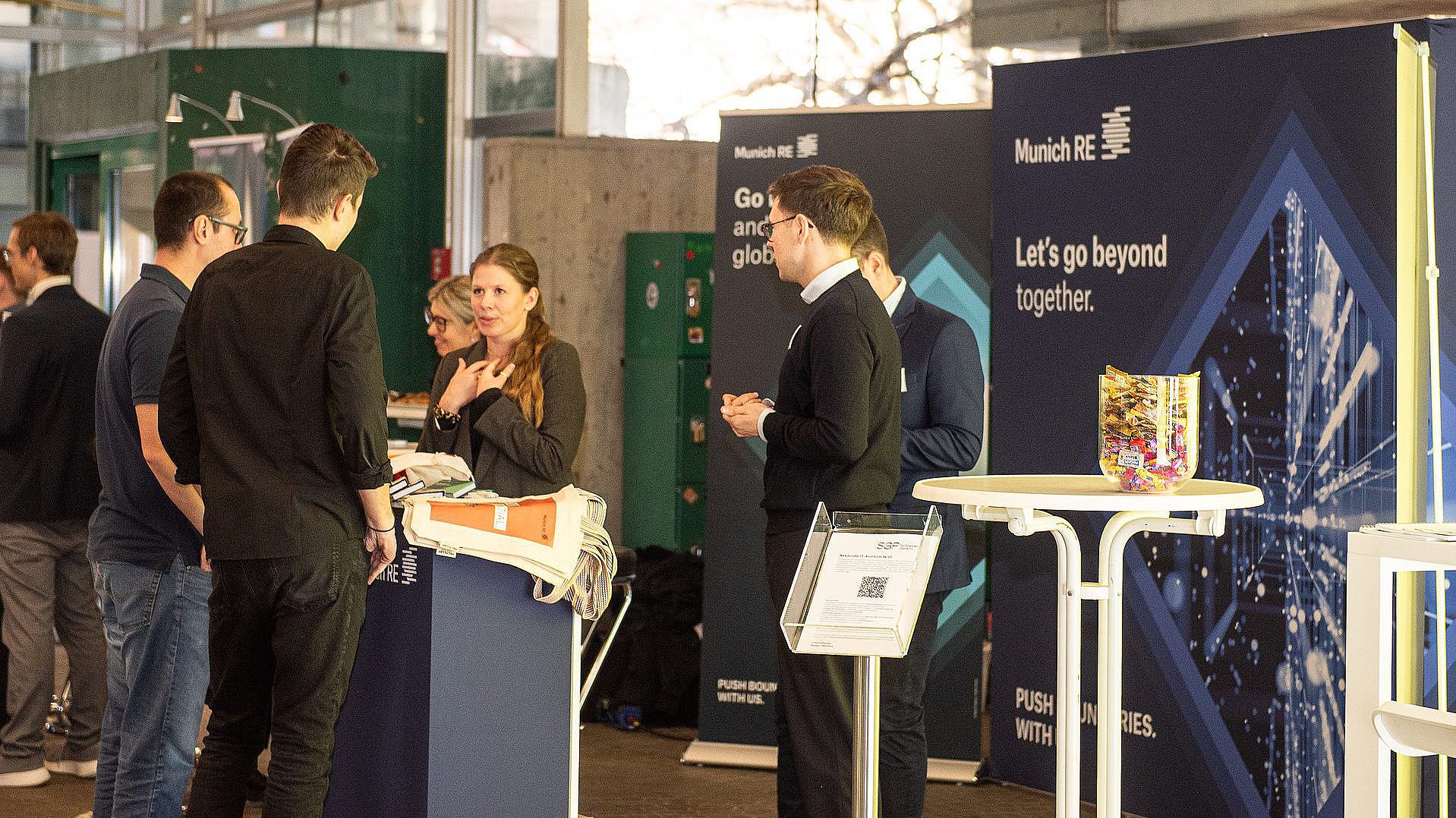 Students at the WiMa Congress at exhibition stands