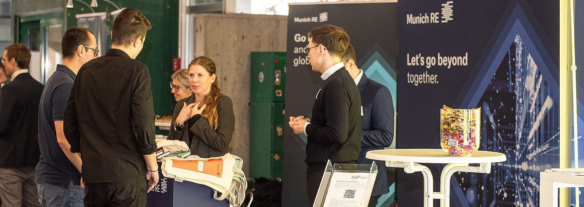 Students talking to a company representative