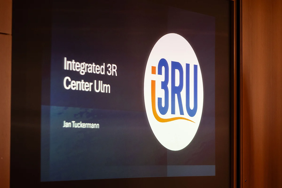 Projected logo "i3RU"