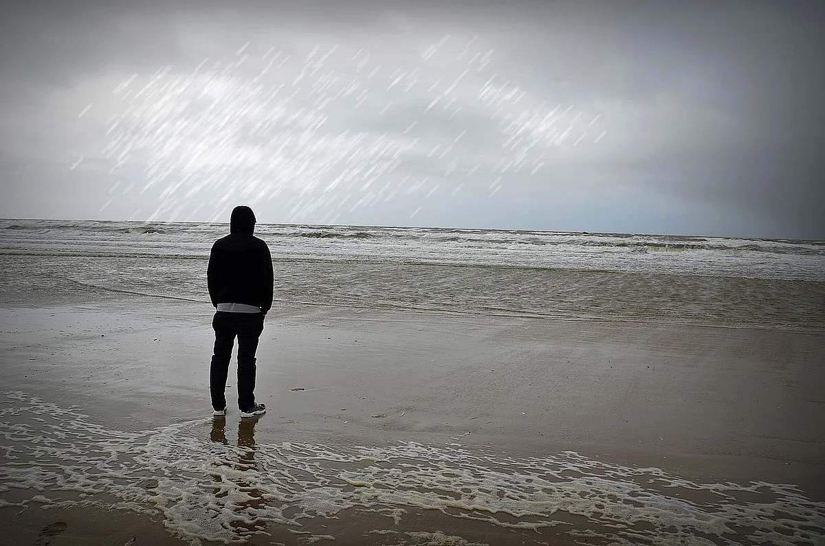 Einsamer Mann am Meer