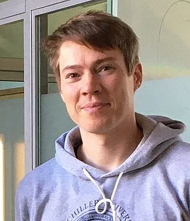 Portraitfoto von Dr. Alexander Rauch