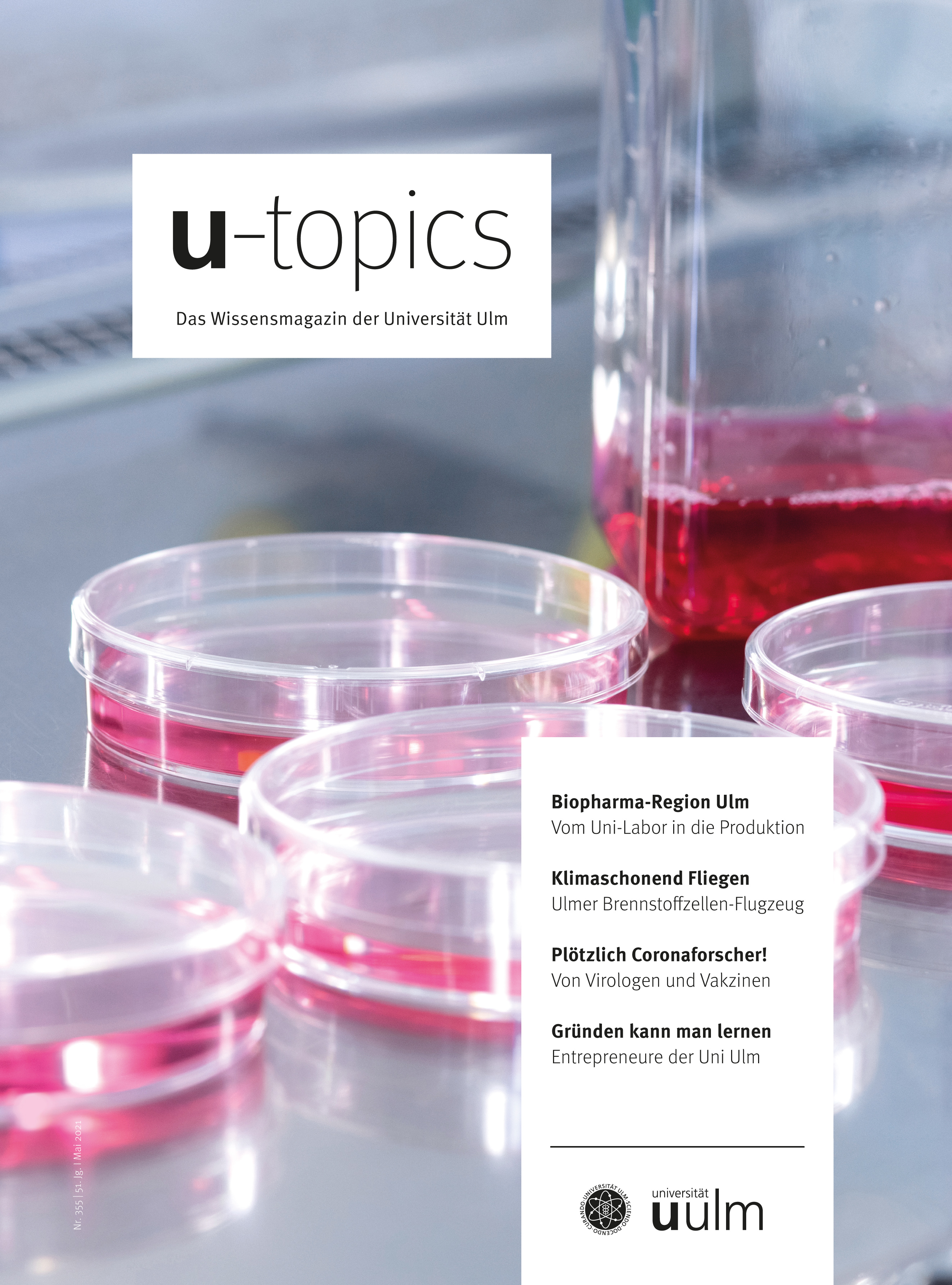 Titelbild U-topics Sommersemester 2021 - Petrischalen mit rosa Flüssigkeit