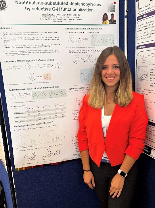 PhD student Jessi Bajrami at her poster with the title „Naphthalin-substituted dithienopyrroles by selective C-H functionalization“.