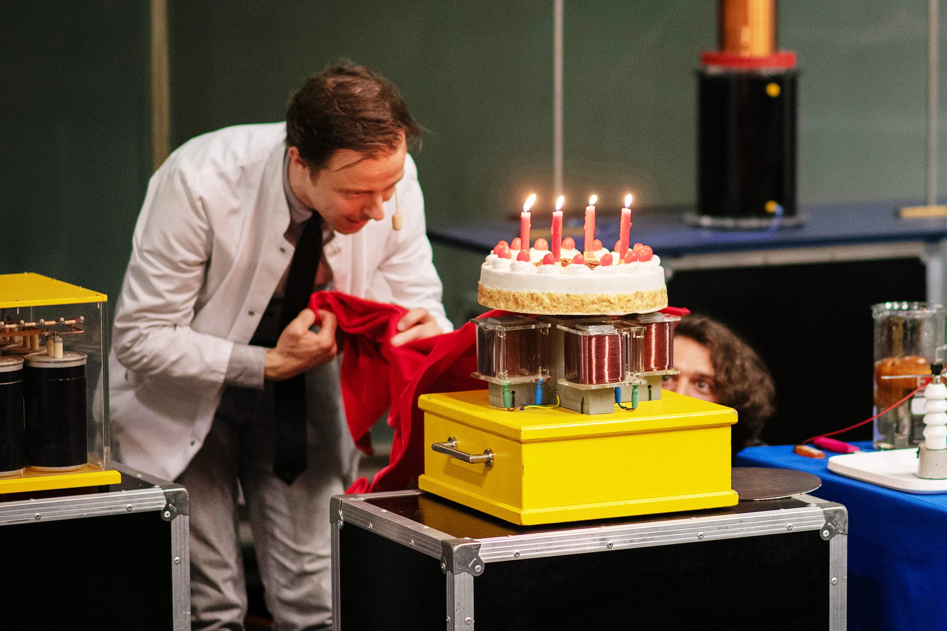 Scientist unveils birthday cake in lecture hall